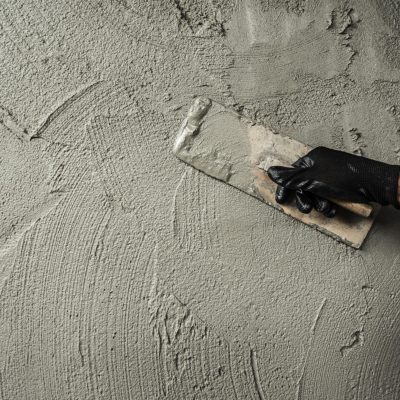 Hand,Worker,Plaster,Cement,Wall,Background,With,Hand,Holding,Work